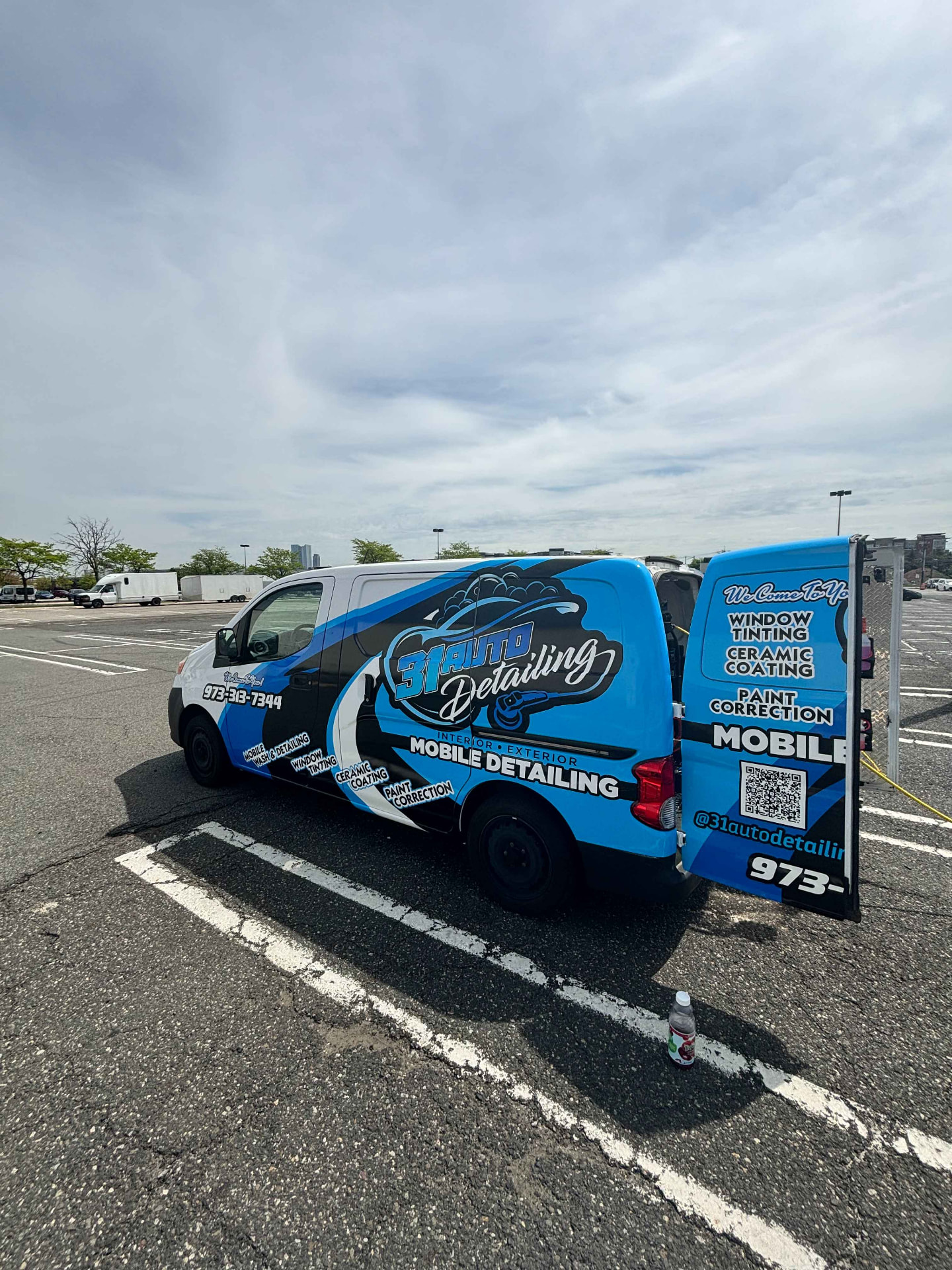 The wrapped 31 Auto Detailing mobile detailing van