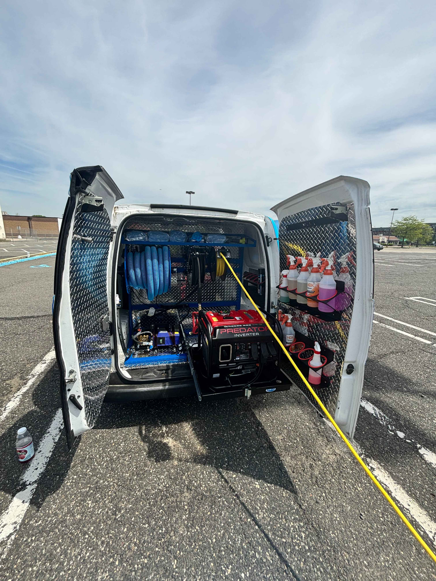 Inside the fully equipped 31 Auto Detailing van with generator, hose reel and pro-grade chemicals